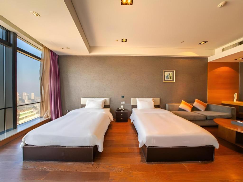 Grand Madison Qingdao Harbour-View Central（Former Qingdao Farglory Hotel） Eksteriør billede