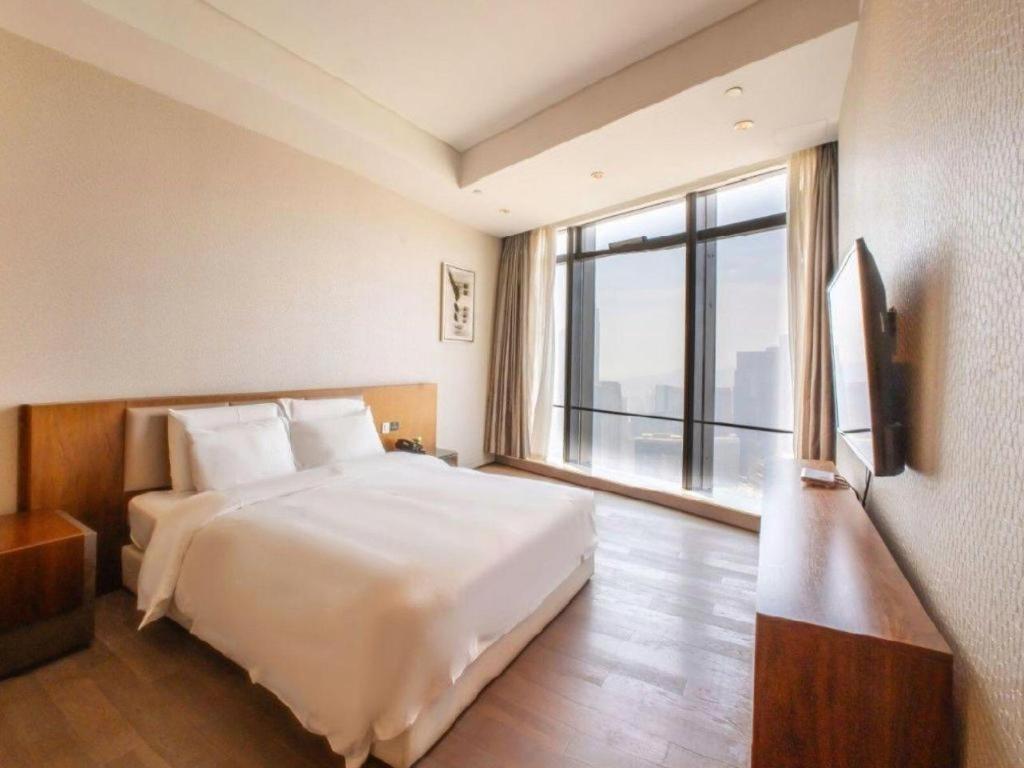 Grand Madison Qingdao Harbour-View Central（Former Qingdao Farglory Hotel） Eksteriør billede